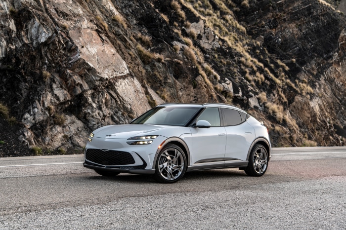 Genesis GV60 electric SUV on a road