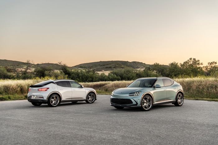 Genesis GV60 electric SUVs in a landscape
