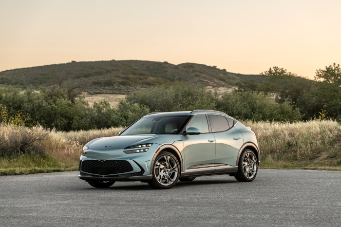 Genesis GV60 electric car on a road