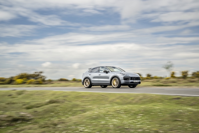 Porsche Cayenne Turbo driving on a road