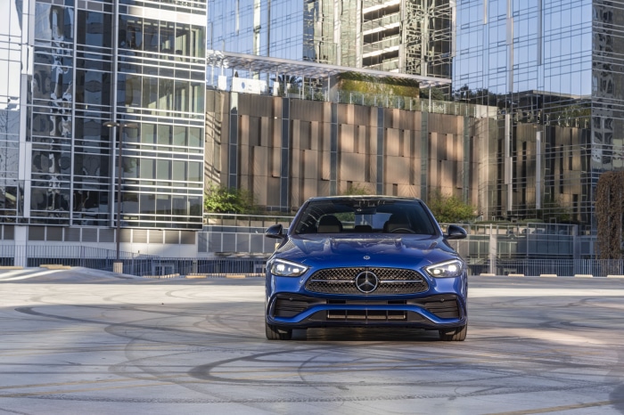 Blue Mercedes-Benz C 300 parked in urban setting
