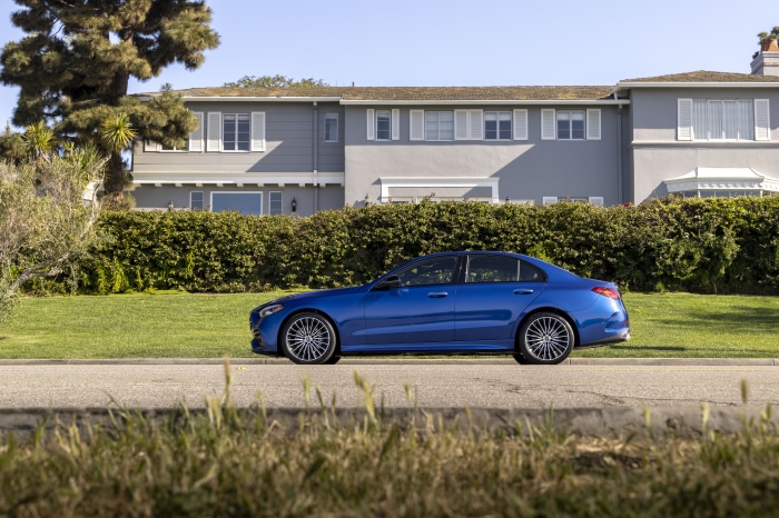 Blue Mercedes-Benz C 300 parked on a street