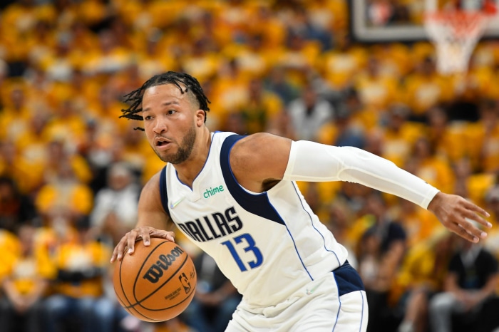 Jalen Brunson of Dallas Mavericks dribbling basketball