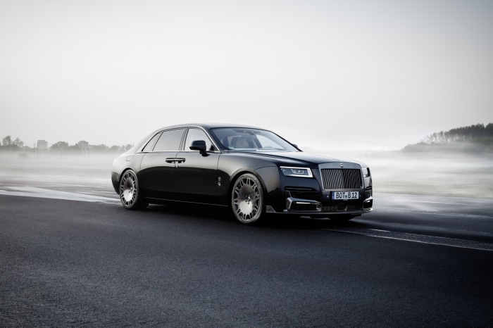 Black Rolls-Royce Ghost on a Misty Road