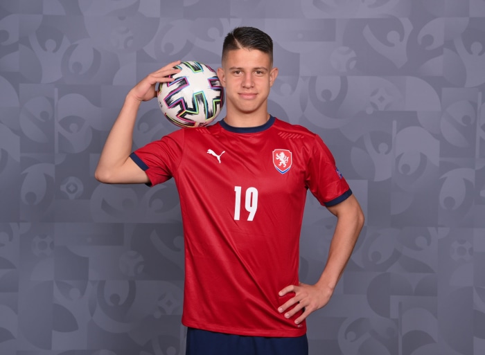 Adam Hložek with a soccer ball