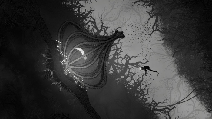 A diver explores a strange, bioluminescent plant in a dark forest