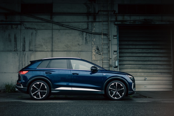 Audi Q4 E-tron parked in front of a building