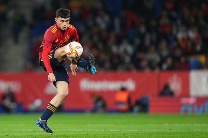 Pedri playing soccer for Spain
