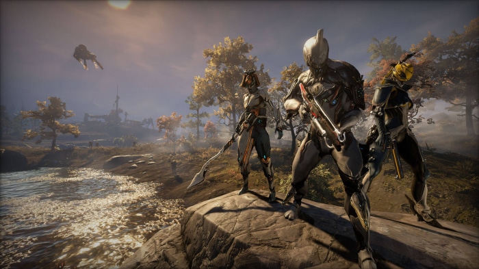 Warframe characters in a landscape