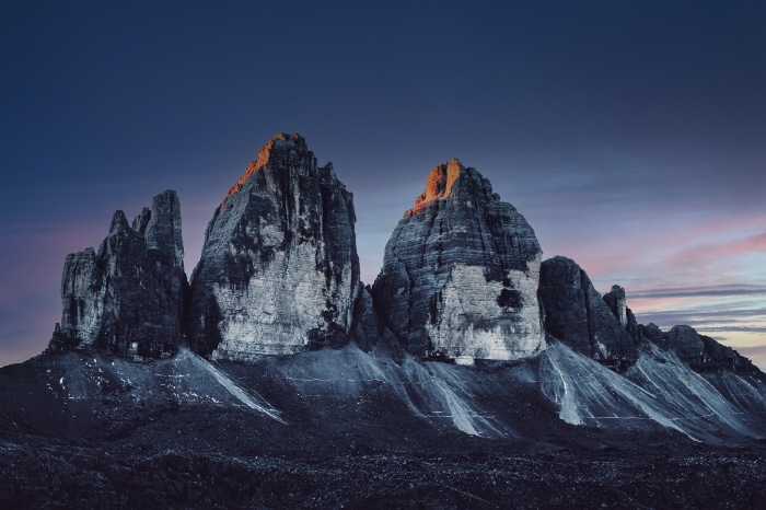 Tre Cime Di Lavaredo mountains at dusk