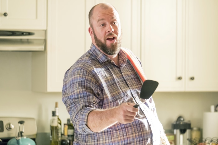 Man from This Is Us holding a spatula