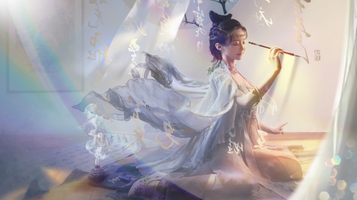 Asian woman painting with brush 4K