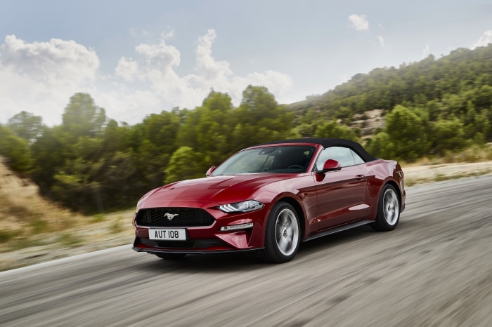 Red Ford Mustang Convertible on a Road