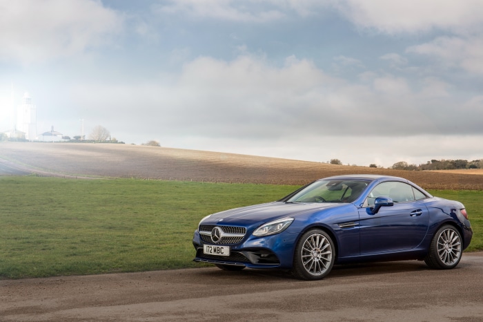 Blue Mercedes-Benz SLC 300 R172 on a country road