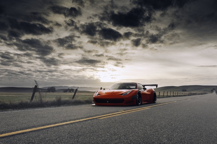 Red Ferrari 458 Italia GT3 on a Road
