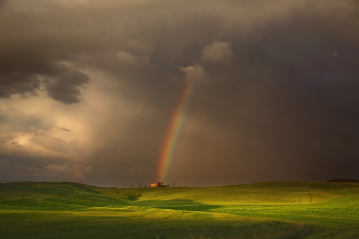 Rainbow over a Tuscan landscape in Italy