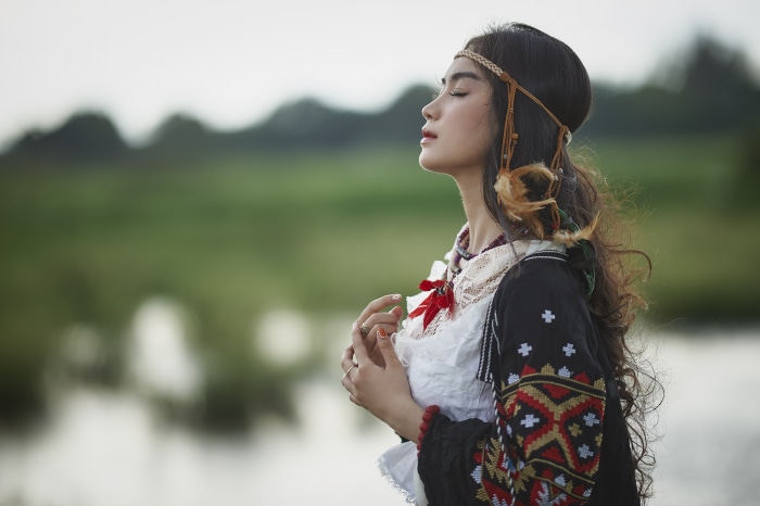 Asian woman with traditional clothing and headband