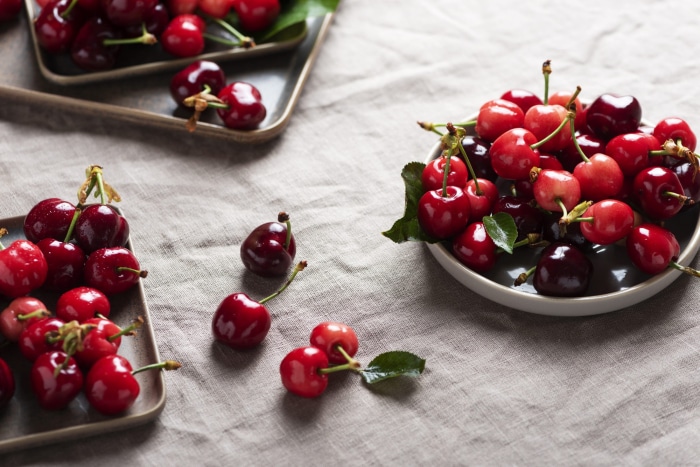 Cherries on Plates and Tablecloth