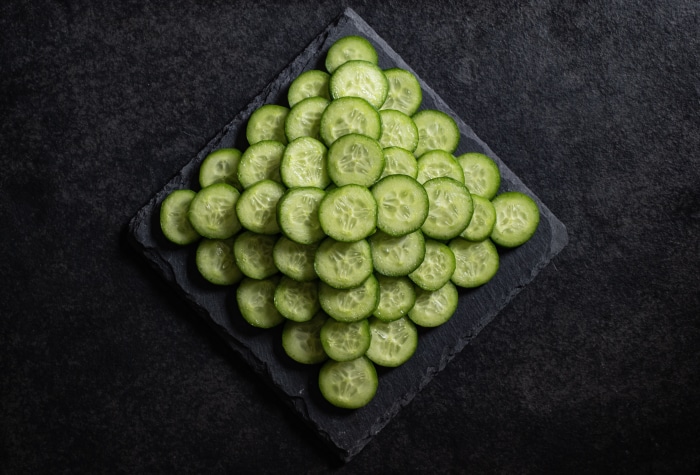 Sliced Cucumber on Dark Slate