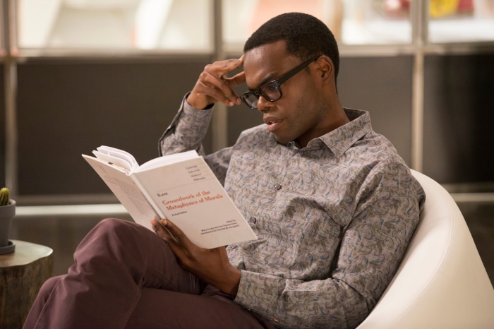 Chidi Anagonye reading Groundwork of the Metaphysics of Morals