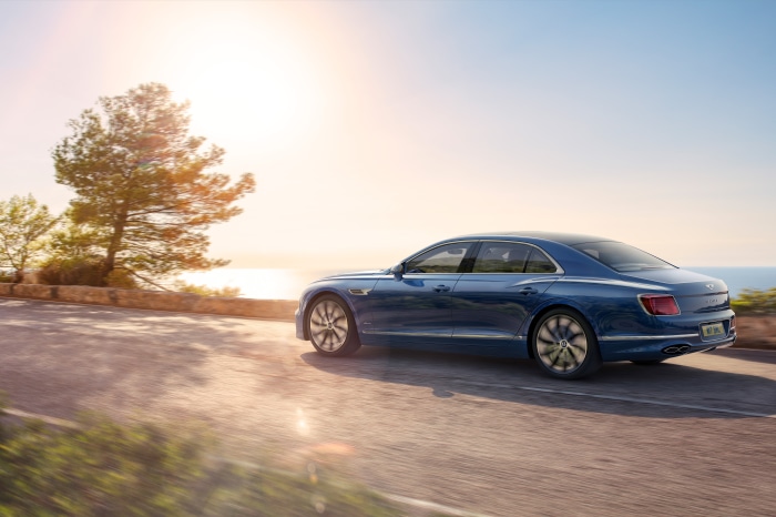 Bentley Flying Spur Azure driving on coastal road