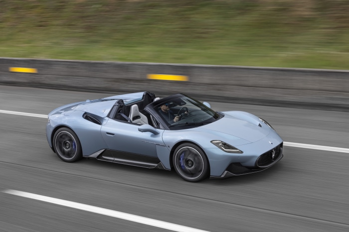 Maserati MC20 Cielo convertible driving on a highway