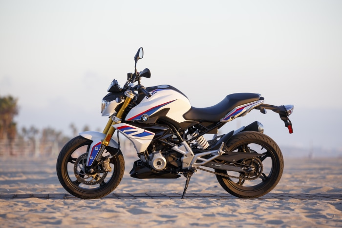 BMW G310R motorcycle on a beach 4K