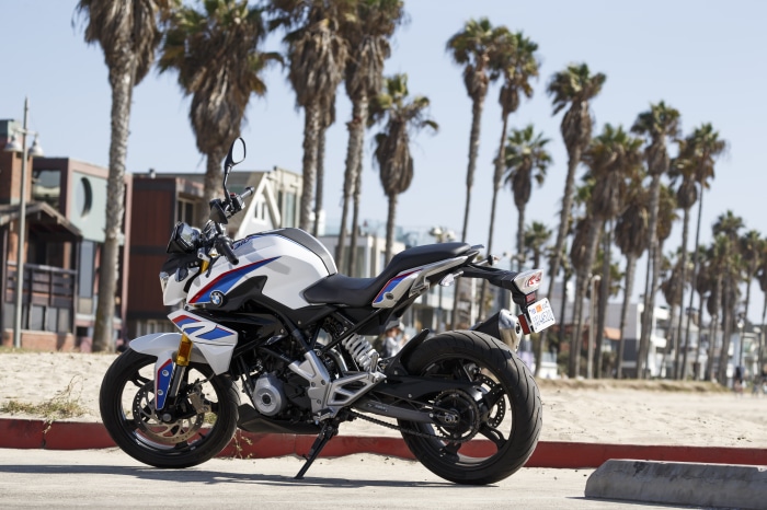 BMW G310R motorcycle on beach road