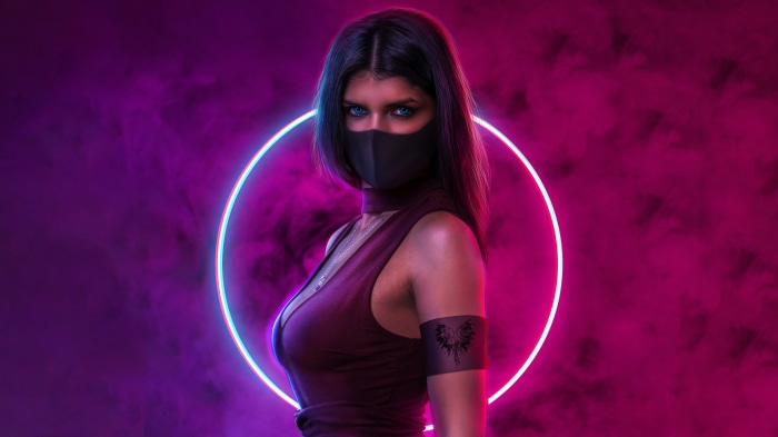 Woman in mask with neon circle