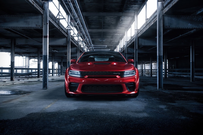 Red Dodge Challenger SRT Hellcat Widebody in industrial building