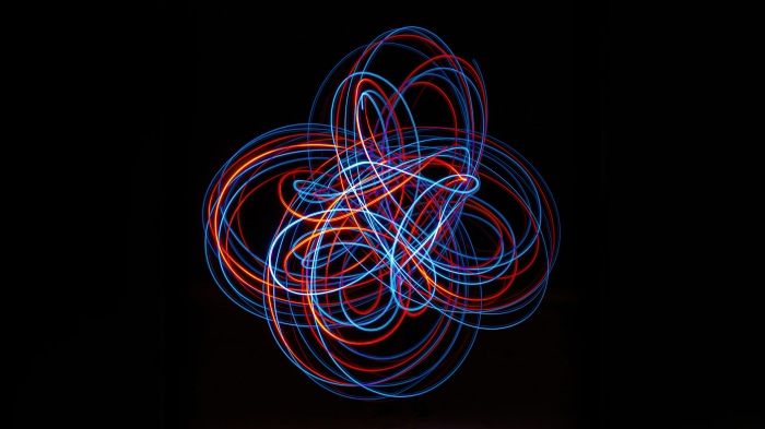 Abstract light painting with red and blue swirls