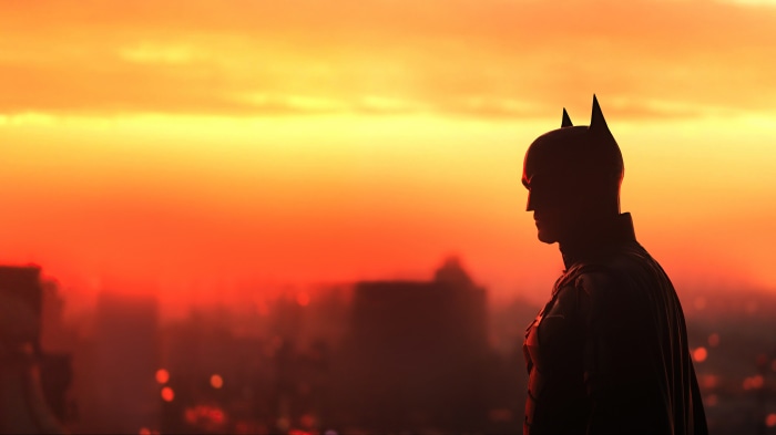 The Batman silhouette against a sunset