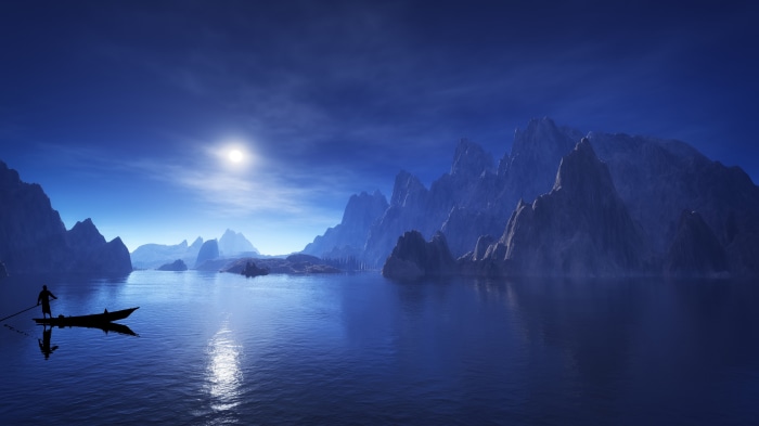 Man in boat on lake with mountains and sun