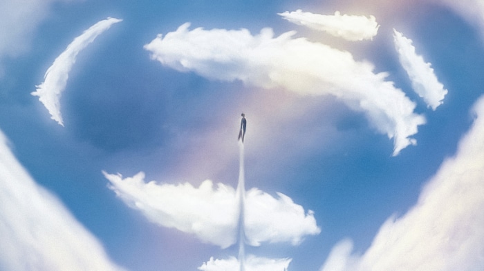 Superman flying through clouds