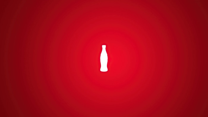 Coca-Cola bottle on red background