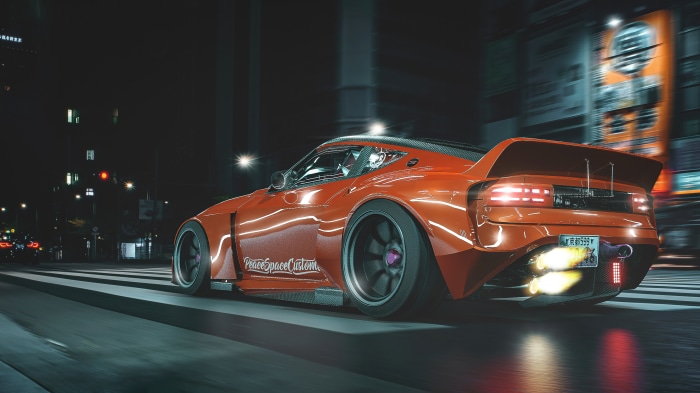 Orange Nissan 300ZX with flames at night