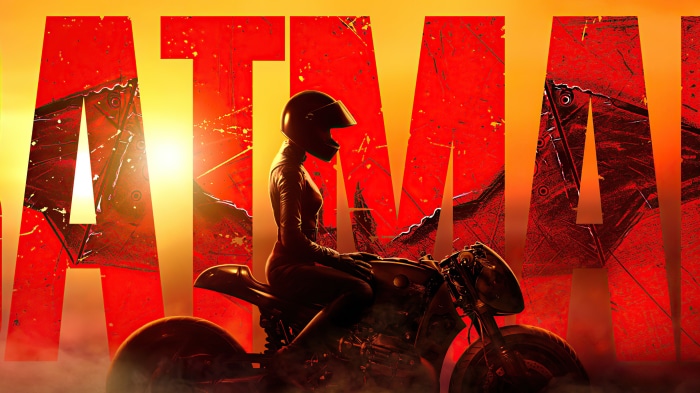 The Batman movie poster with a woman on a motorcycle