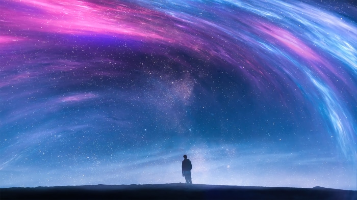 Man standing under a colorful nebula 4K