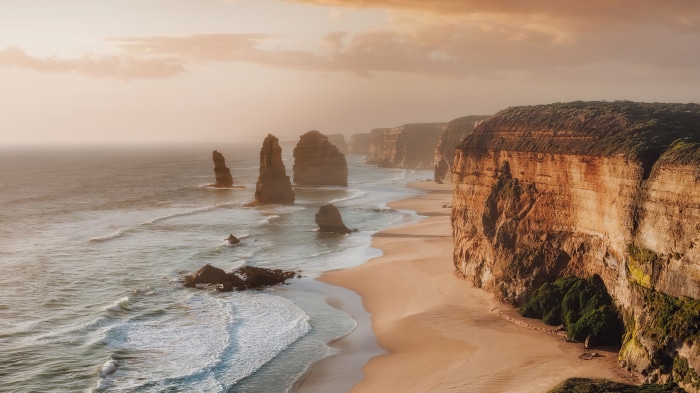 Scenic Beach with Cliffs and Ocean Waves