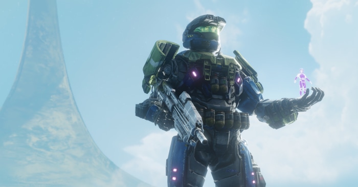 Master Chief from Halo holding a hologram