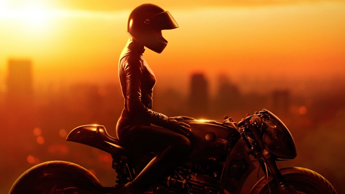 Catwoman from The Batman on a motorcycle