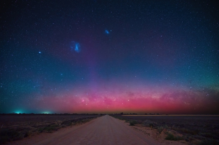 Milky Way over a dirt road at night