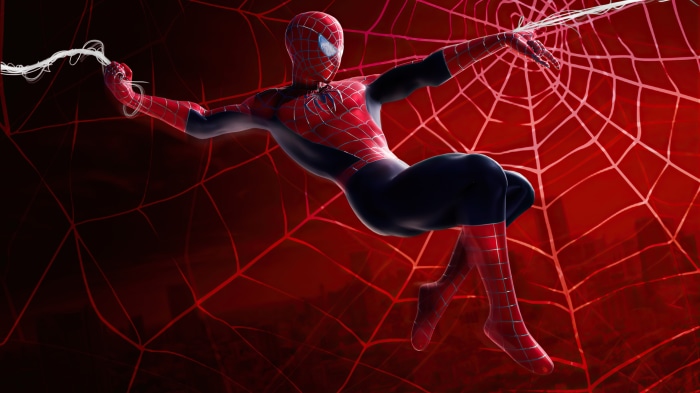 Spider-Man swinging on a web