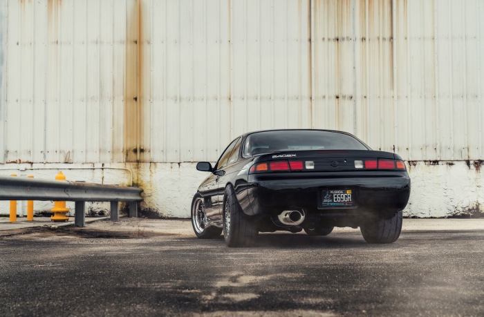 Black Nissan 240SX with custom exhaust