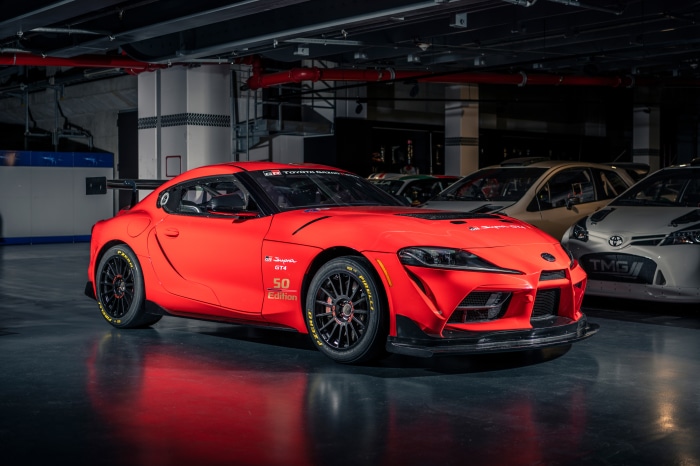 Red Toyota GR Supra GT4 50 Edition race car