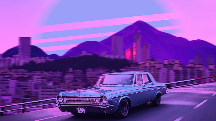 Retro car driving through a neon city at dusk