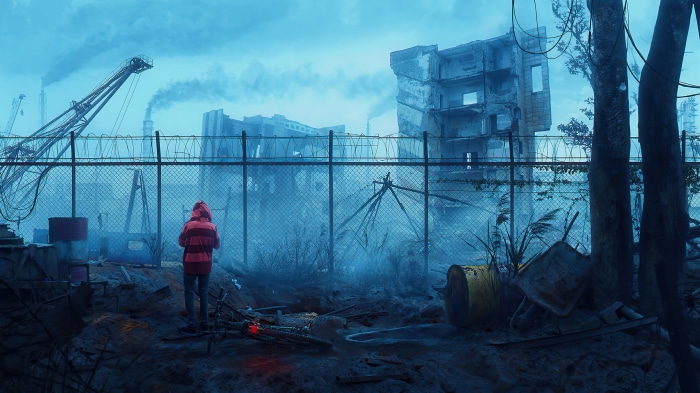 Person in red hoodie in industrial wasteland
