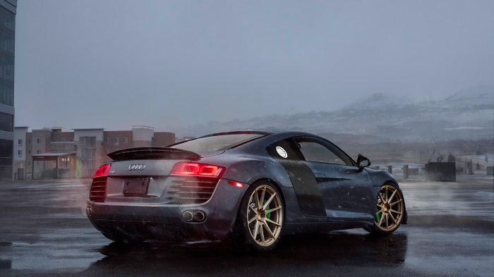 Audi R8 sports car on wet asphalt