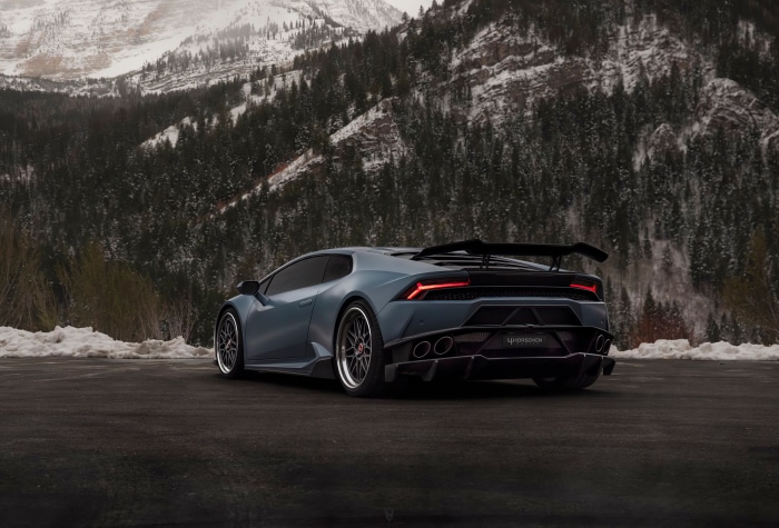Lamborghini Huracan rear view in snowy mountains