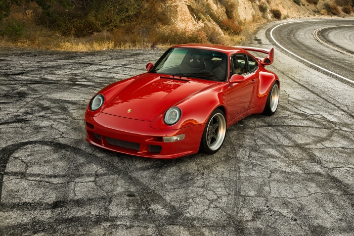 Red Porsche 911 400R on a Winding Road